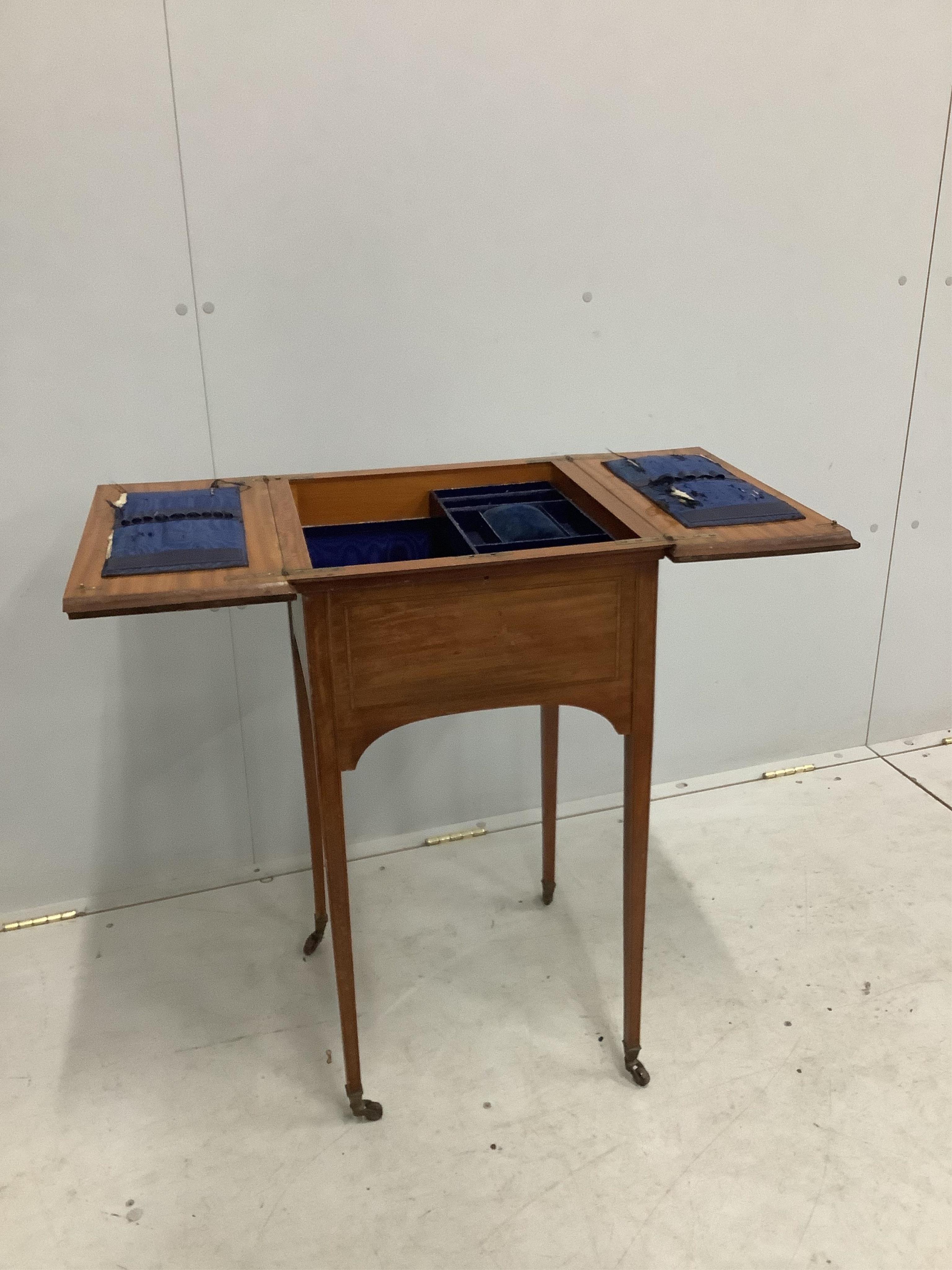 An Edwardian satinwood work table, width 42cm, depth 44cm, height 74cm. Condition - poor to fair